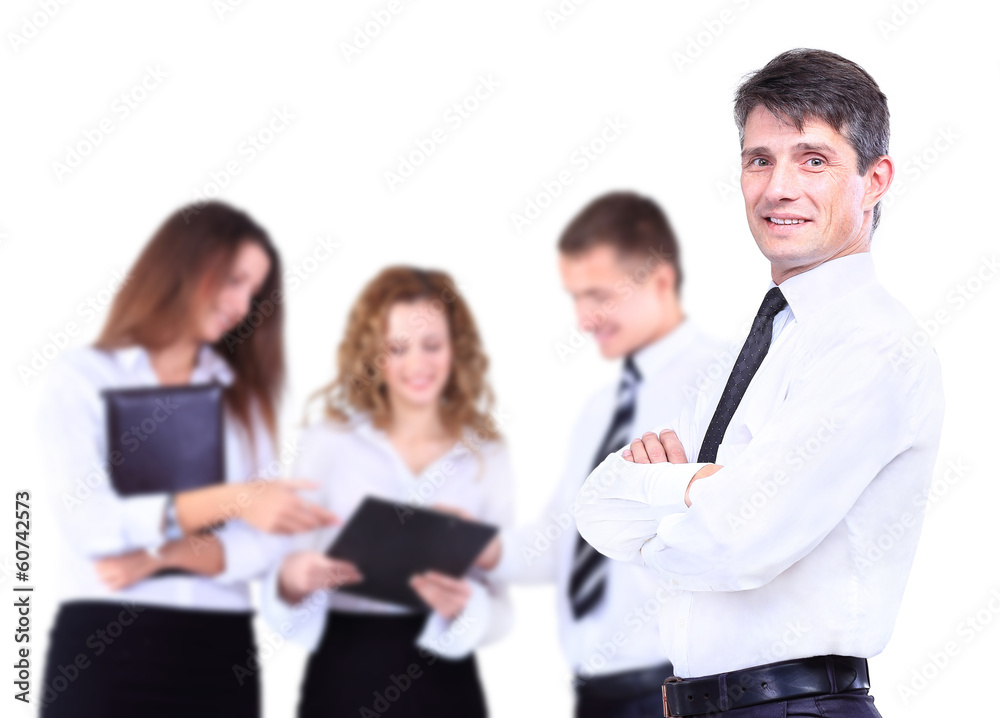 Successful business man standing with his staff Successful business man standing with his staff