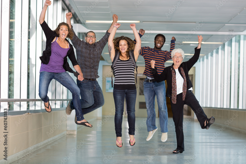 Fototapeta premium Excited Multiethnic University Students Jumping