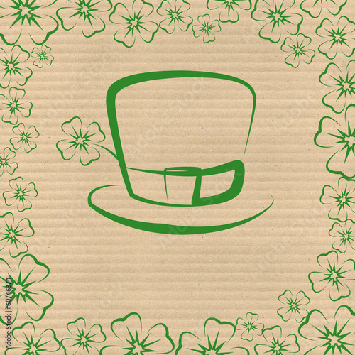 Clover leaves on cardboard
