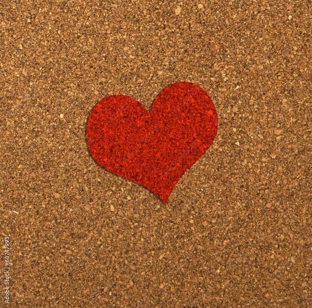 Red heart on a cork board. Red heart on a cork board.