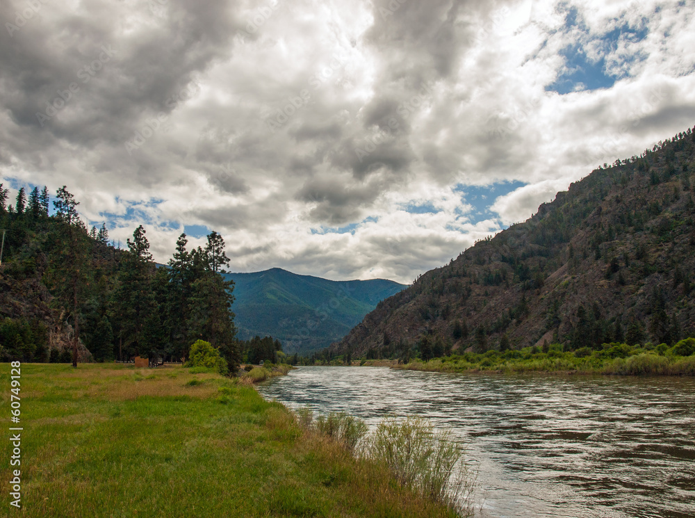 Wide Mountain River Cuts a Valley - Clark Fork River Montana USA Wide Mountain River Cuts a Valley - Clark Fork River Montana USA