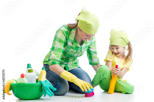 young housewife mother and her kid do homework together