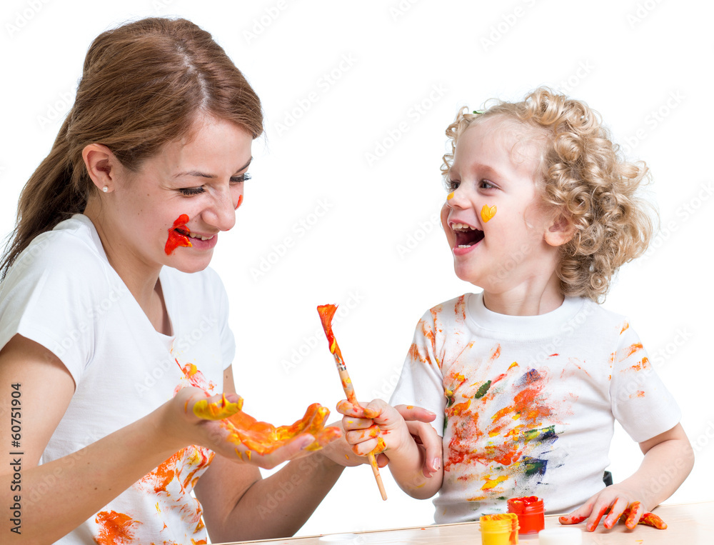 happy mother and kid girl painting together happy mother and kid girl painting together