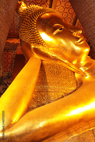 The Golden Reclining Buddha in Wat Pho temple photo