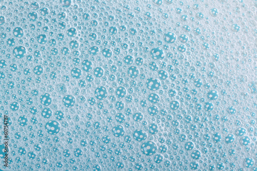 background of suds with bubbles blue close up. macro