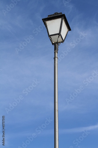 lamppost in blue sky