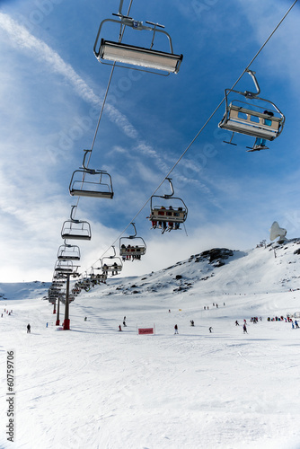 Chairlift in winter resort