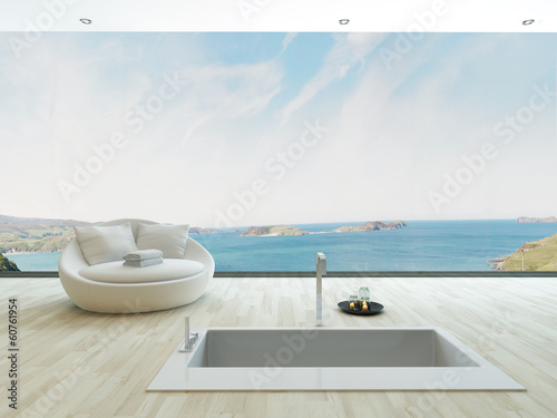 Obraz na plátne Modern floor bathtub against huge window with seascape view
