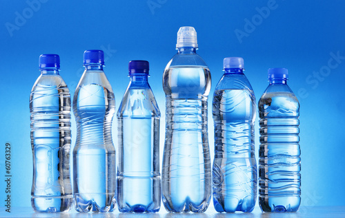 Composition with assorted plastic bottles of mineral water