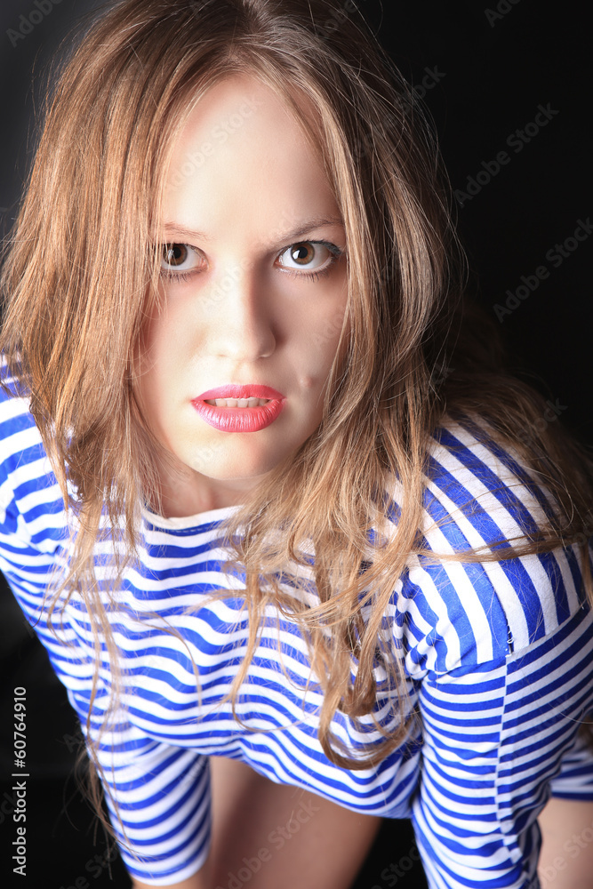 young woman in striped hoodie young woman in striped hoodie