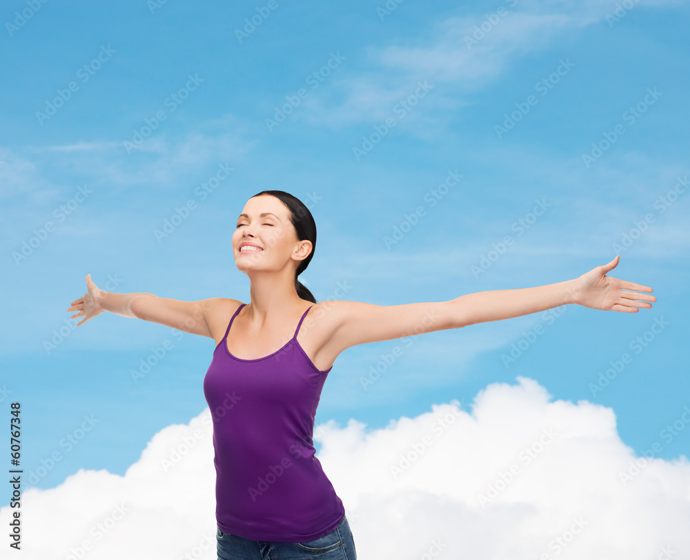 smiling girl in blank purple tank top waving hands smiling girl in blank purple tank top waving hands