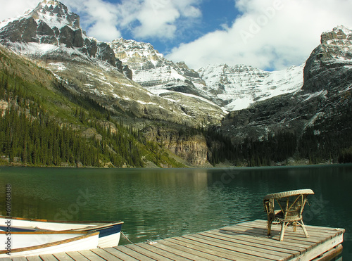 Chair on a wooden pier, Lake O'Hara, Yoho National Park, Canada photo