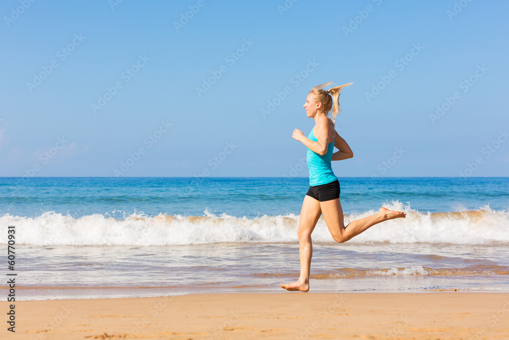 Woman running on beach Woman running on beach