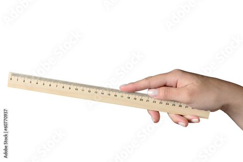 Woman's hand holding a ruler