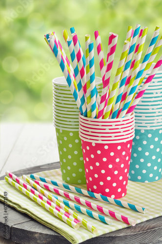 Paper cups and striped straws photo