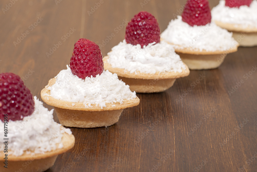 Tartlets with protein cream and raspberries. Tartlets with protein cream and raspberries.
