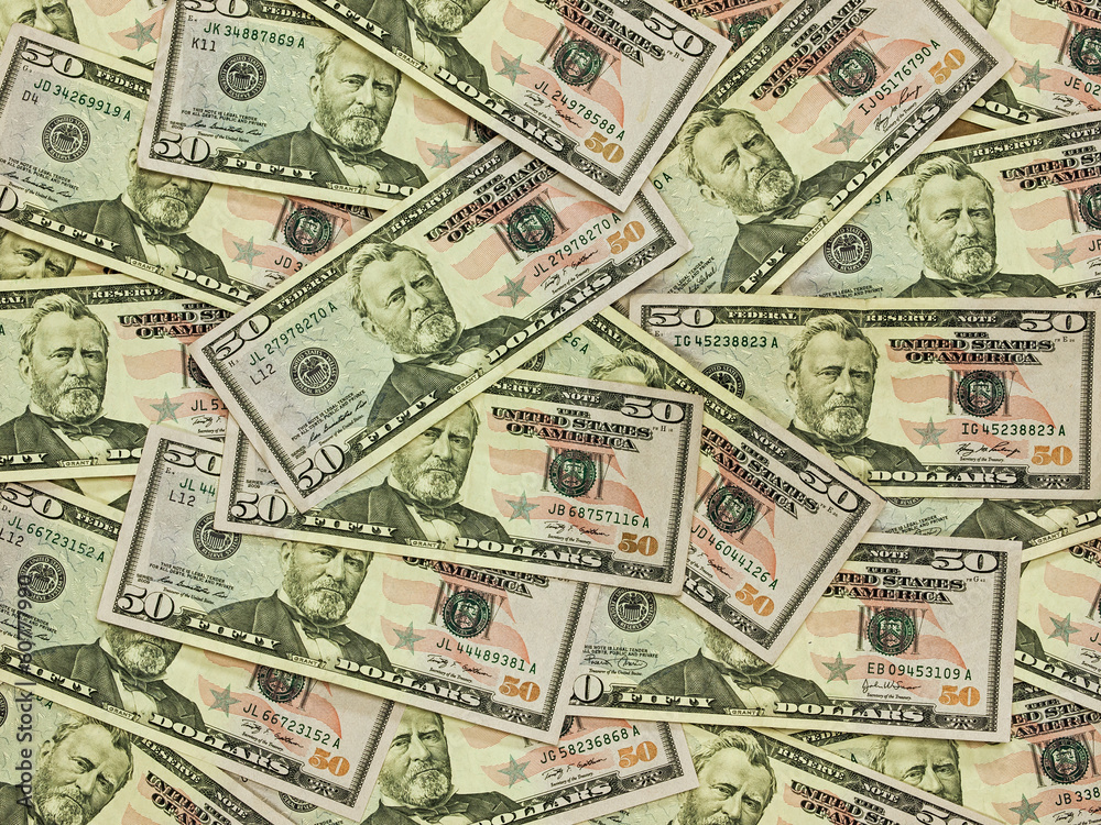 A Pile of Fifty Dollar Bills as a Money Background