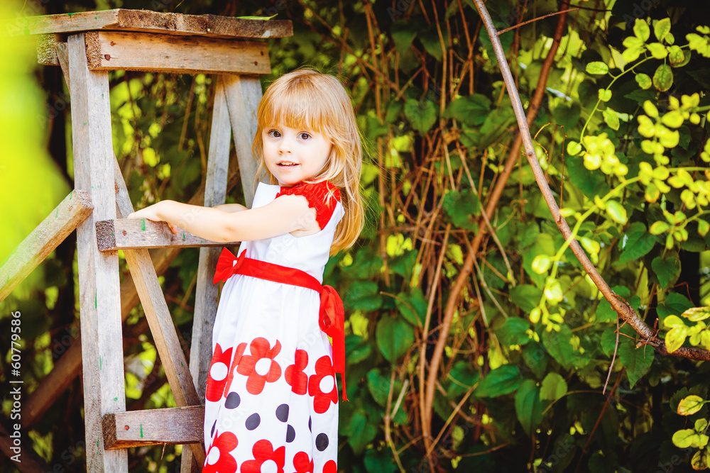 Portrait of beautiful little girl in summer green park Portrait of beautiful little girl in summer green park