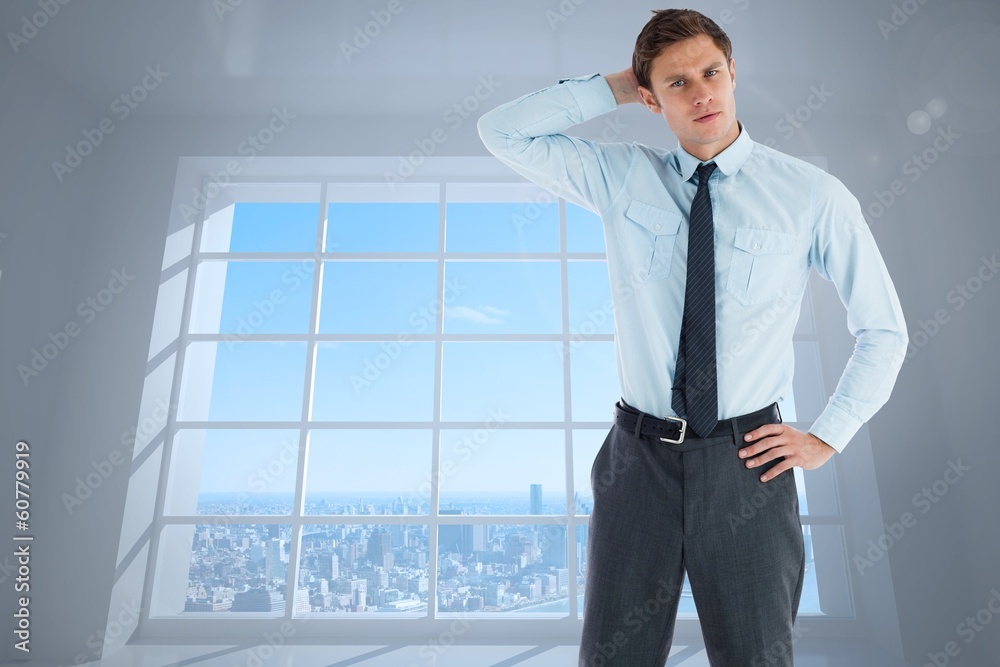 Composite image of thoughtful businessman with hand on head