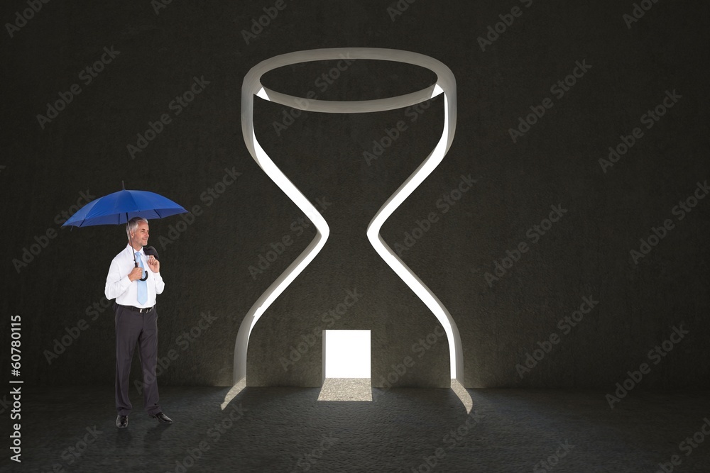 Composite image of happy businessman holding umbrella Composite image of happy businessman holding umbrella