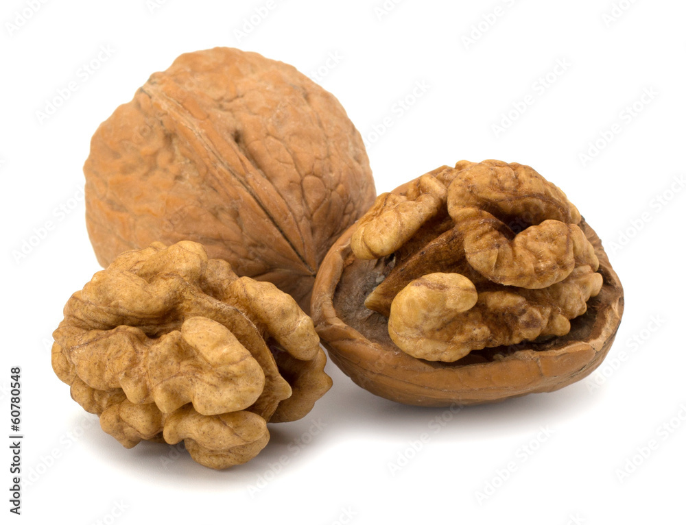 walnut and a cracked walnut isolated on the white background walnut and a cracked walnut isolated on the white background
