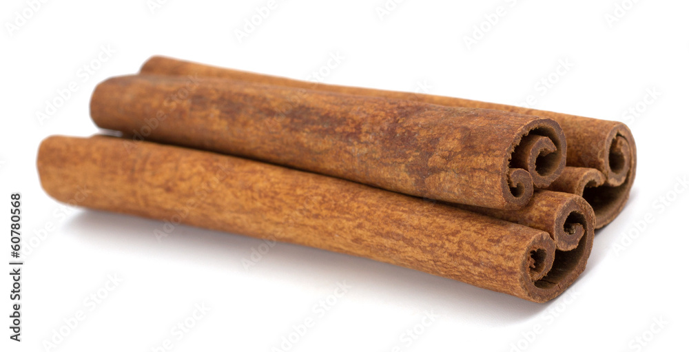 cinnamon sticks stacked on white background cinnamon sticks stacked on white background