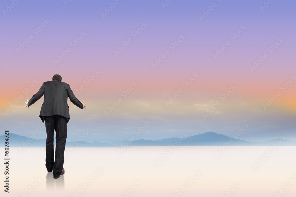 Fototapeta premium Composite image of gesturing businessman