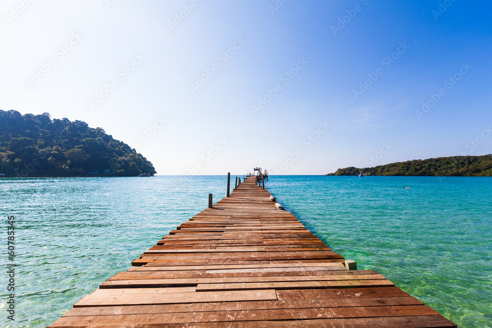 Wooden pathway. Tropical Resort. boardwalk on beach Wooden pathway. Tropical Resort. boardwalk on beach