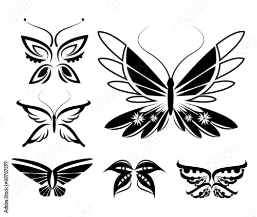 set of butterflies silhouettes isolated on white background © chanitar