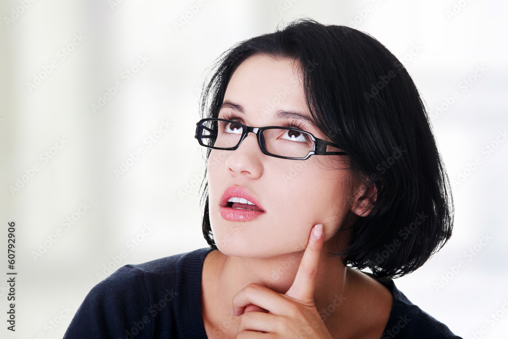 Young beautiful woman in casual clothes thinking Young beautiful woman in casual clothes thinking