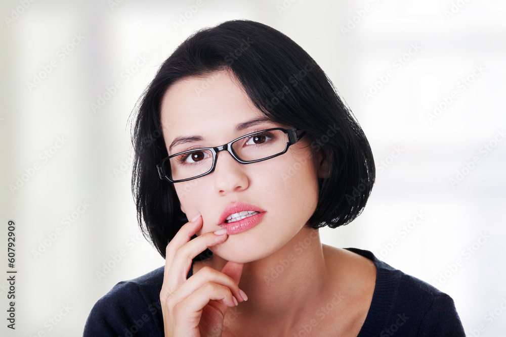 Young beautiful woman in casual clothes thinking Young beautiful woman in casual clothes thinking