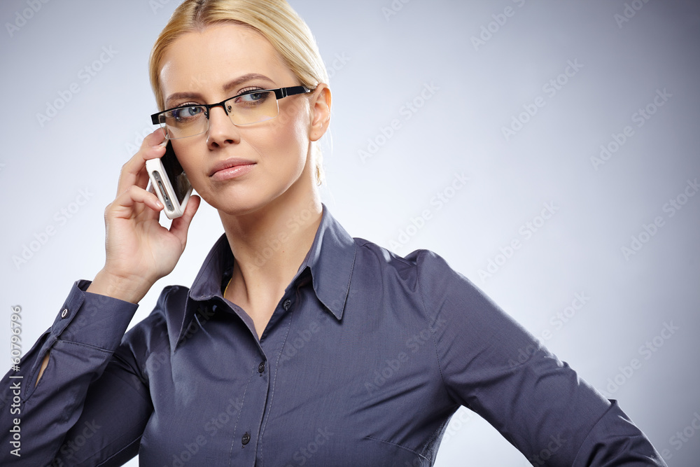 successful businesswoman with cell phone, isolated on white bac successful businesswoman with cell phone, isolated on white bac