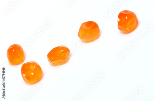 red caviar on a white background. macro