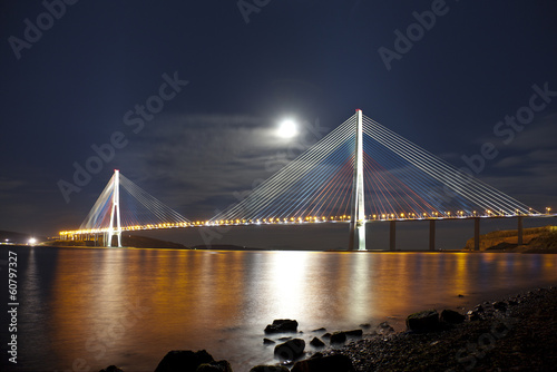 Bridge Russky in Vladivostok at moonlit night. Russia photo