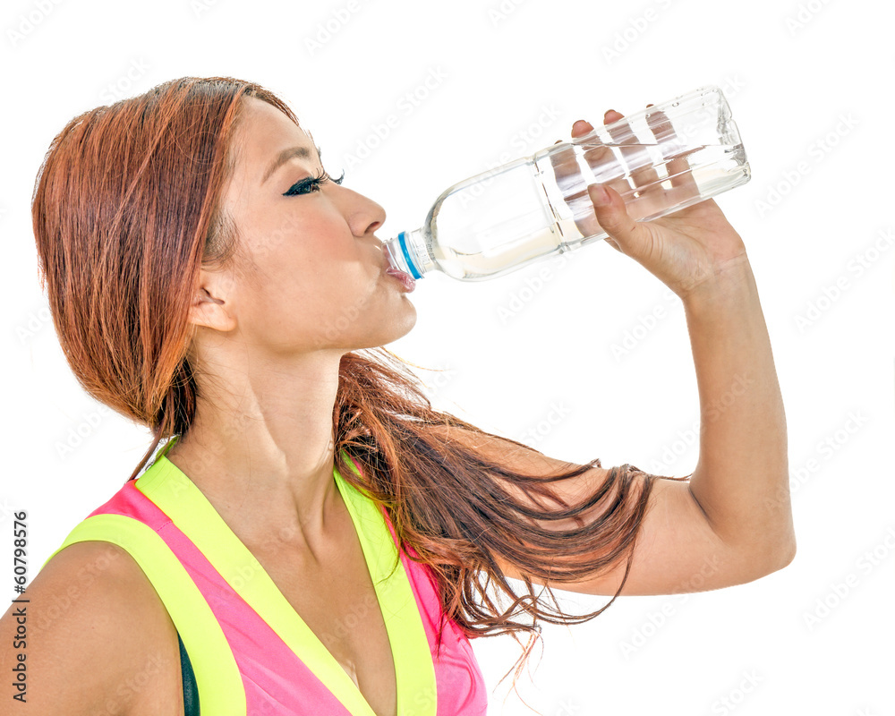 Attractive Asian woman drinking water after workout Attractive Asian woman drinking water after workout