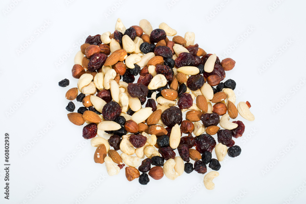 mixed nuts and dried fruits isolated on white background mixed nuts and dried fruits isolated on white background