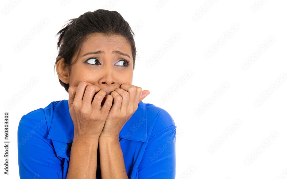 Anxious, horrified, concerned woman biting fingernails Anxious, horrified, concerned woman biting fingernails