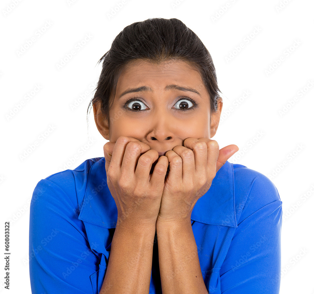 Anxious, horrified, concerned woman biting fingernails Anxious, horrified, concerned woman biting fingernails