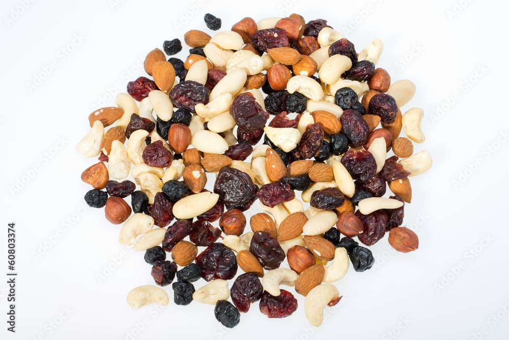 mixed nuts and dried fruits isolated on white background mixed nuts and dried fruits isolated on white background