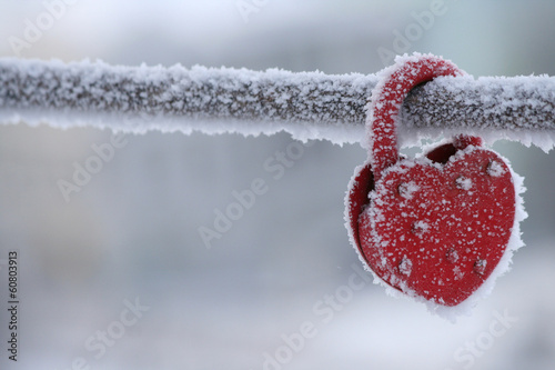 frozen heart-shaped lock as a love symbol photo