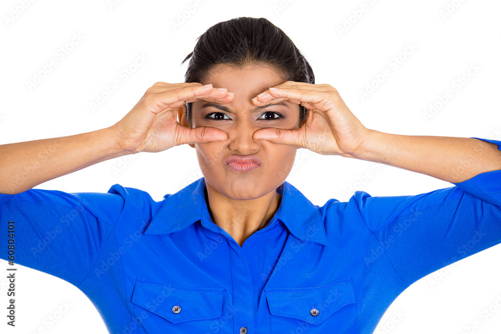 Woman peeking looking through binoculars displeased face Woman peeking looking through binoculars displeased face