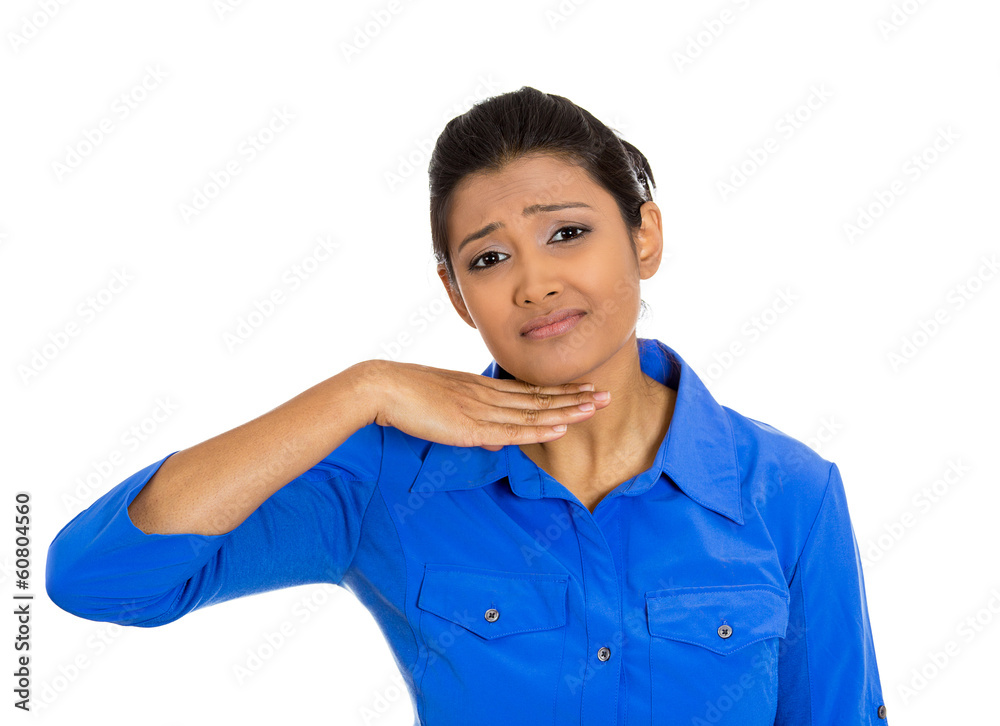 Young woman gesturing with hand to stop talking, cut it out Young woman gesturing with hand to stop talking, cut it out