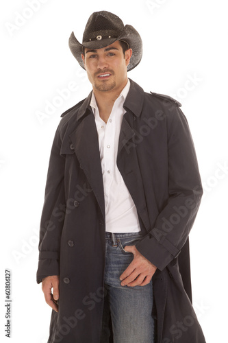 cowboy in coat hand in pocket
