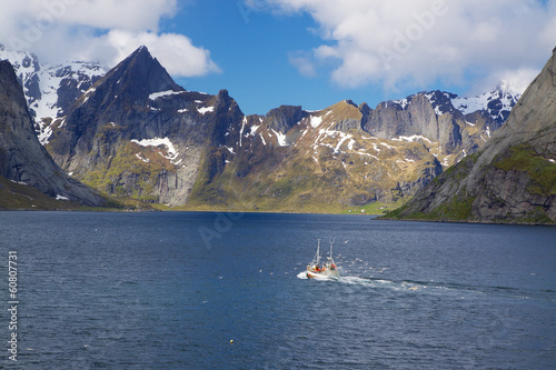 Fishing boat in fjord