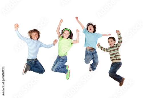 Four joyful children jumping