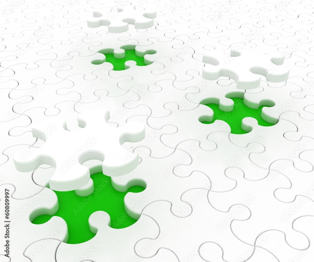 White puzzle on green background. Isolated 3D image White puzzle on green background. Isolated 3D image