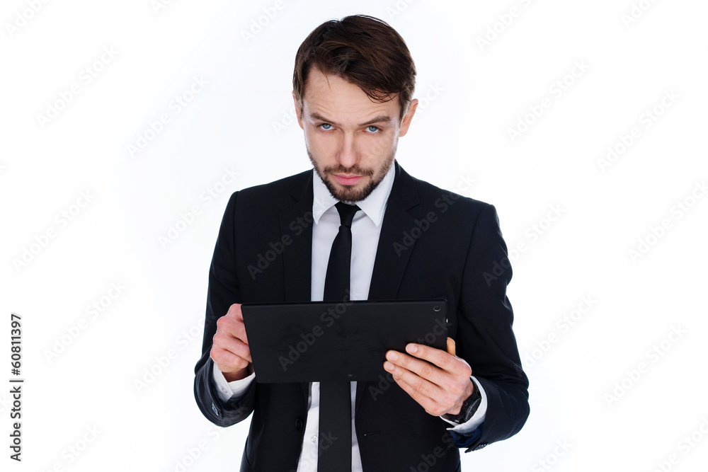 Businessman looking at the tablet Businessman looking at the tablet