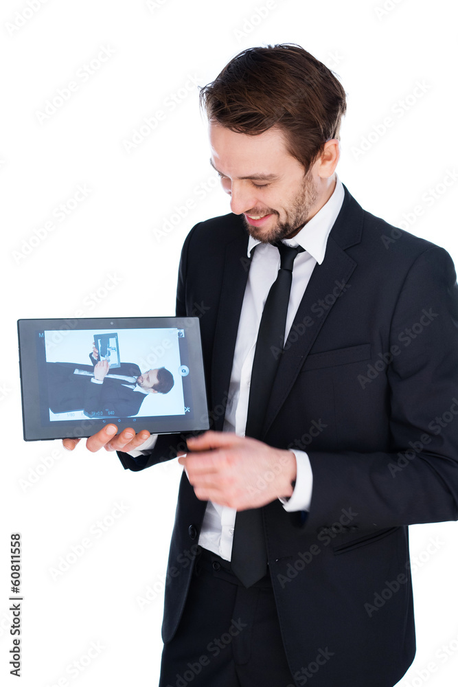 Man displaying a handheld tablet computer Man displaying a handheld tablet computer