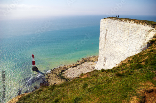 Cliff and lighthouse photo