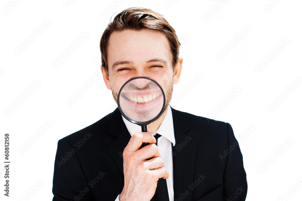 Businessman with a magnified smile Businessman with a magnified smile